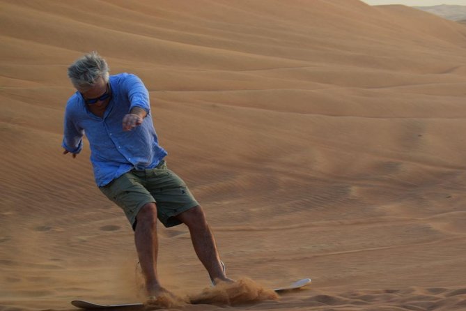 Dune Bashing with Quad Bike and Sand Boarding from Dubai - Who will get the most from this tour