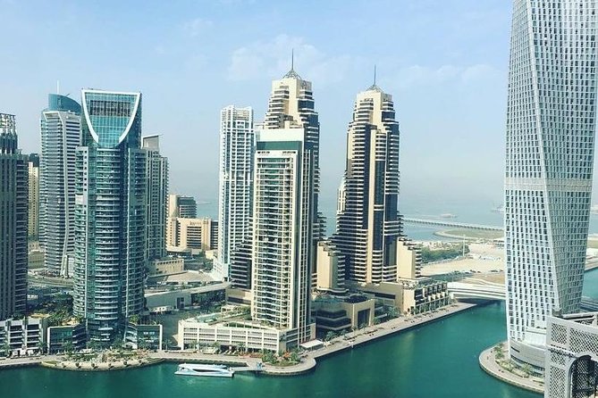 DXB Private Half-Day Dubai City Tour: Iconic Sights & Landmarks - Jumeirah Beach frames the Arabian Gulf