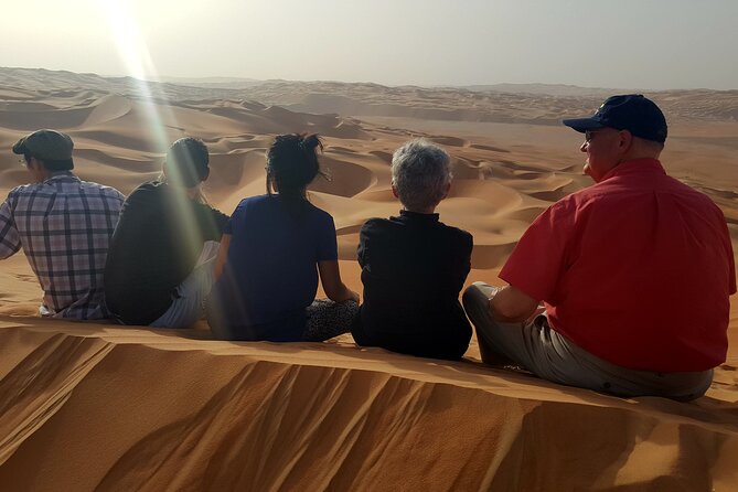 Empty Quarter Sunset Desert Safari - Camel farm and oasis picnic