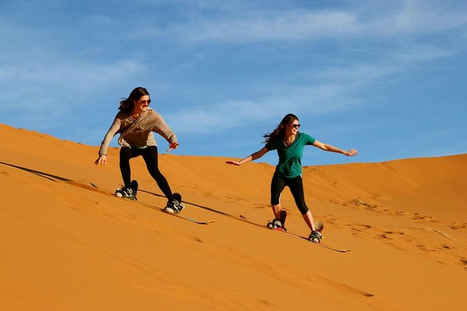 Enjoy Desert Safari With BBQ Dinner and Many More - Sunset photography among the dunes