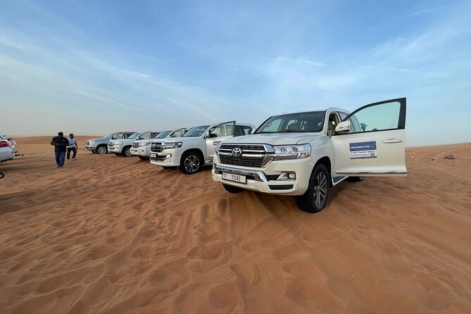 Evening Desert Safari - Camel riding and sandboarding at camp