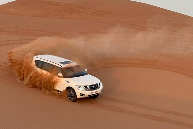 Evening Desert Safari Camel Ride Live Shows Shisha Dinner - Sunset photos among the red sands