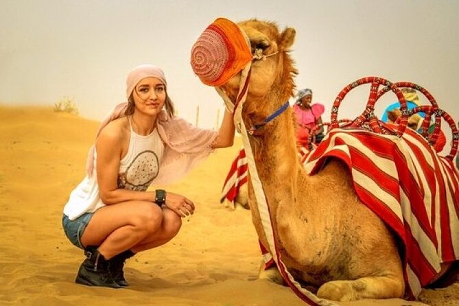 Evening Desert safari Dubai With Quad Bike Ride & BBQ dinner - A one-round camel ride and traditional camp touches
