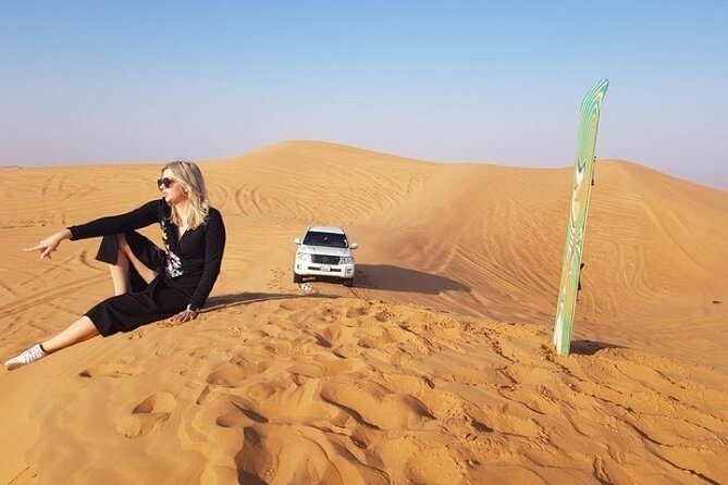 Evening Desert safari Dubai With Quad Bike Ride & BBQ dinner - Tanura, belly dancing, and the fire show