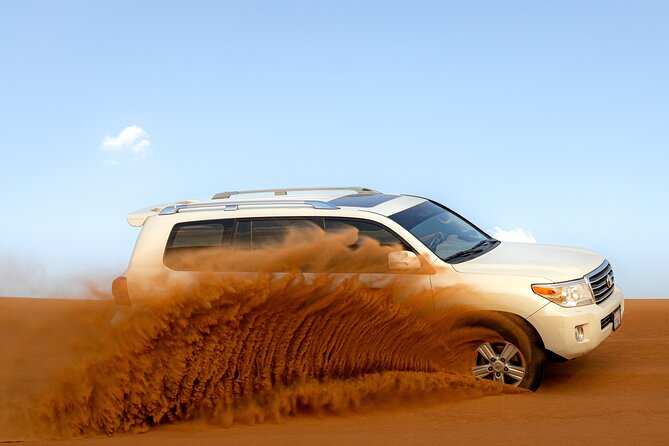 Evening Desert Safari in Dubai, Sandboard & BBQ Dinner - The 4WD dune bash at Lahbab