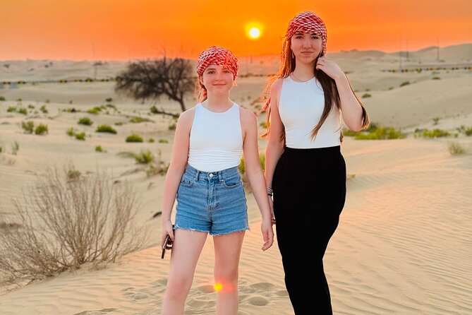 Evening Desert Safari Quad Bike and Live BBQ - Sunset over the Abu Dhabi desert