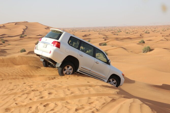 Evening Desert Safari Tour With Dinner & Entertainment - Leaving Dubai behind for Lahbab’s red dunes