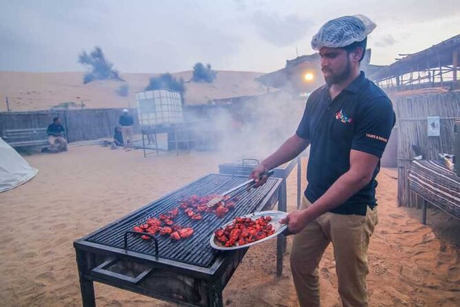 Evening Desert Safari Tour With Dinner & Entertainment - Camel riding, sandboarding, and henna at camp