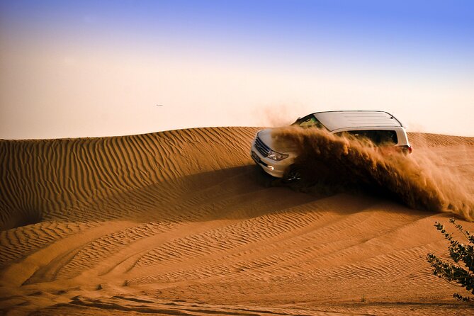 Evening Desert Safari Tour with Sand Surfing, BBQ Dinner (Exclusive Car) - Leaving Dubai for the Red Sands
