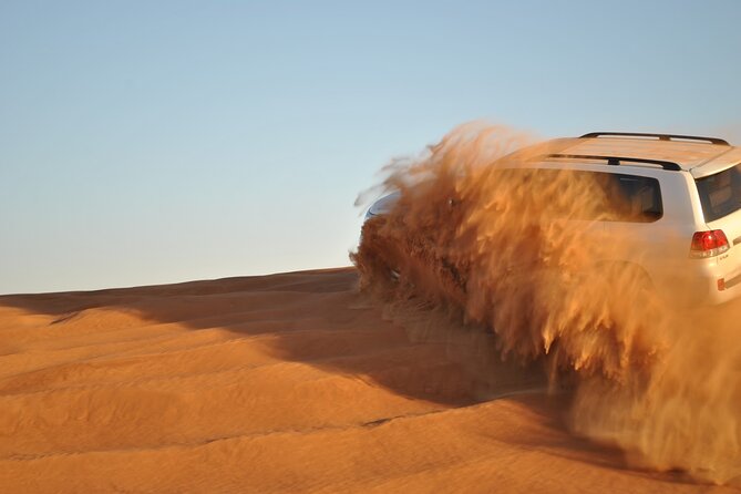 Evening Desert Safari Tour with Sand Surfing, BBQ Dinner (Exclusive Car) - Sandboarding on Soft Slopes