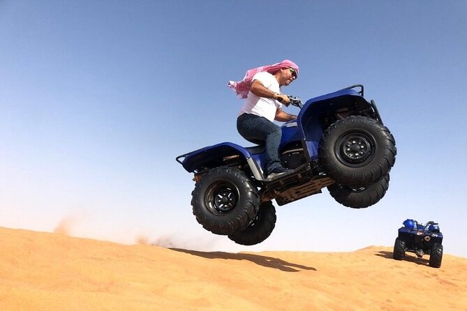 Evening Desert Safari with ATV Quad Bike Dune Bashing BBQ Dinner - BBQ dinner and a full evening of performances