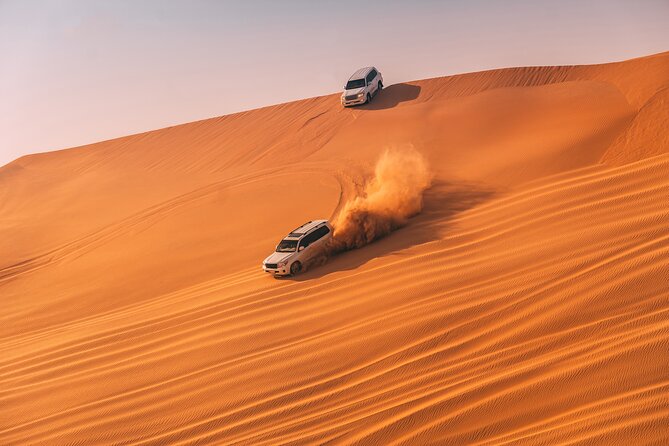 Evening Desert Safari with ATV Quad Bike Dune Bashing BBQ Dinner - ATV quad biking across the golden sand