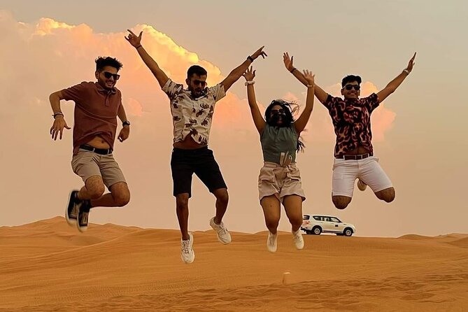 Evening Desert Safari with BBQ Buffet Camel Ride and Arabic Shows - Camel riding and sandboarding at the camp