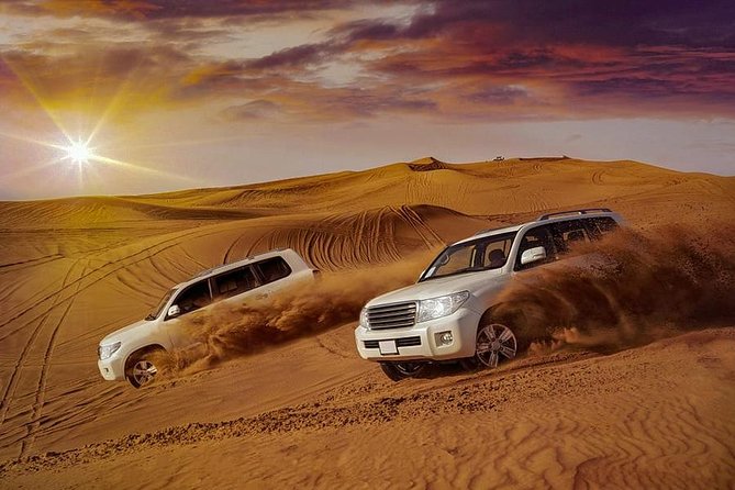 Evening Desert Safari with Belly Dance and BBQ Dinner and Camel Ride - Dune bashing with a licensed desert driver