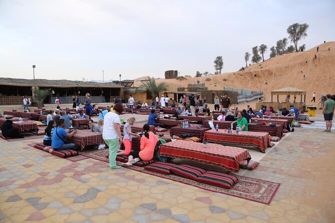 Evening Desert Safari with Camel Ride, BBQ Dinner and Dune Bashing - Dune bashing across Lahbab