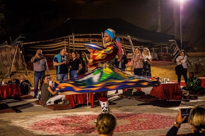 Evening Desert Safari with Camel Ride, BBQ Dinner and Dune Bashing - Belly dancing, Tanoura, and the fire show