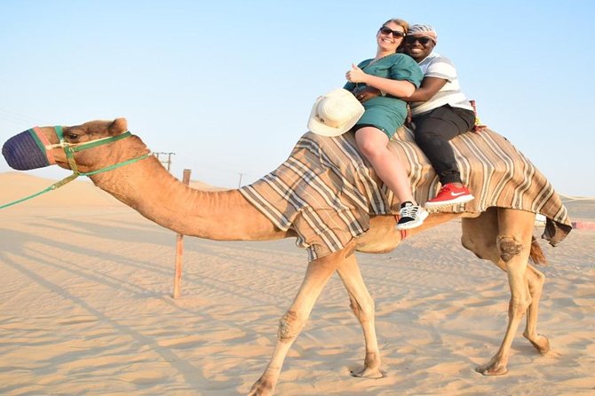 Evening Desert Safari with, Dune Bashing, Camel Ride, sand board - Camel riding, a slower look at the desert
