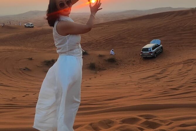 Evening Desert Safari with Quad Bike - Sandboarding on the golden slopes