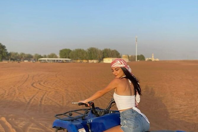 Evening Desert Safari with Quad Bike - Sunset photos, local clothing, and a short camel ride