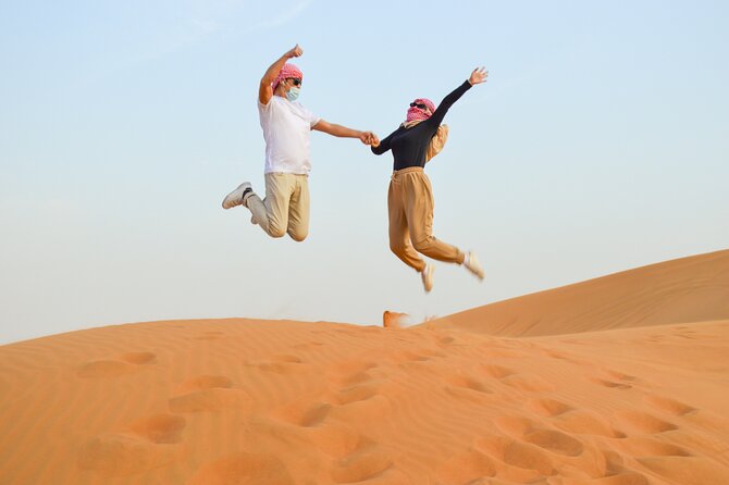 Evening Desert Safari with Quad Bike, BBQ Dinner and Camel Ride - Sandboarding and the short camel ride