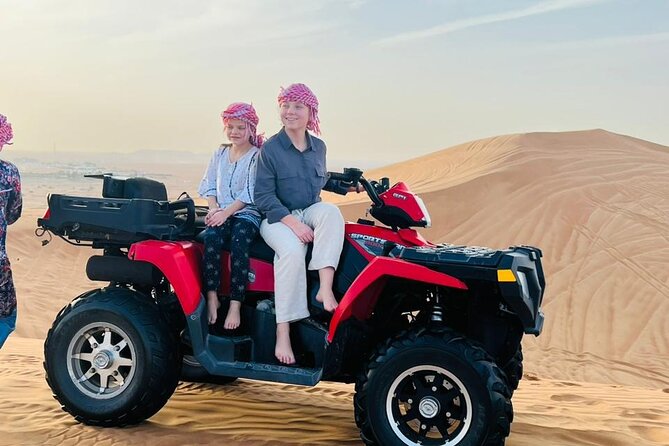 Evening Desert Safari with Quad Bike, Camel Ride & BBQ Dinner - From Dubai hotel pickup to the red dunes