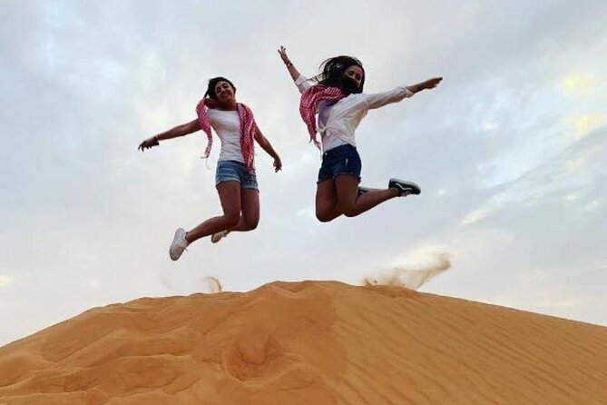 Evening Dubai Desert Safari Experience with Dinner and Shows - Tanoura, fire, and belly dance shows