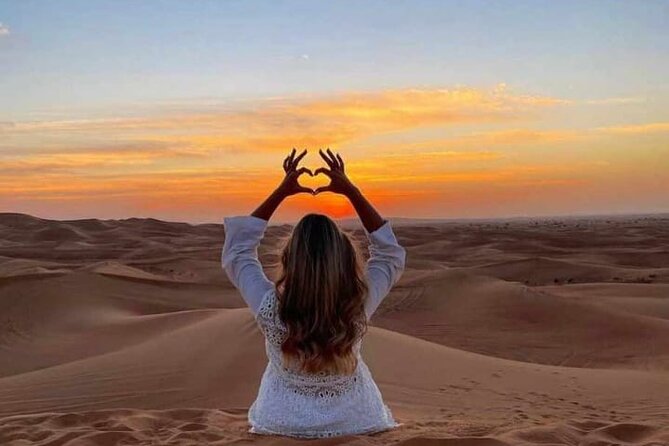 Evening Dubai Desert Safari, Red Sand, Premium camp shows & Diner - Fire, Tanura, and belly dance fill the camp stage