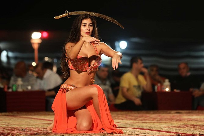 Evening Dubai Safari with BBQ, Dance Shows & Quad Biking optional - A brief camel ride at the Bedouin-style camp