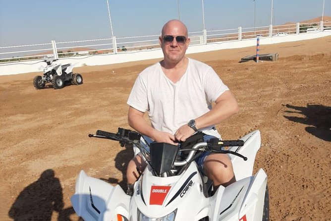 Evening Safari Quad Bike in the desert of Lahbab - Barbecue dinner with a full stage program