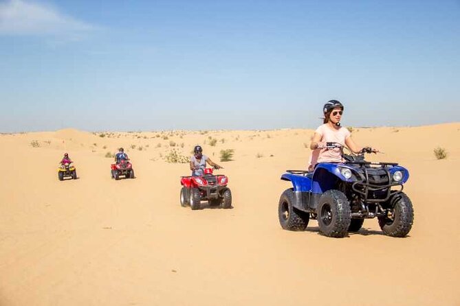 Exciting Morning Desert Safari & Thrilling Quad Bike Ride - Sandboarding down the dunes