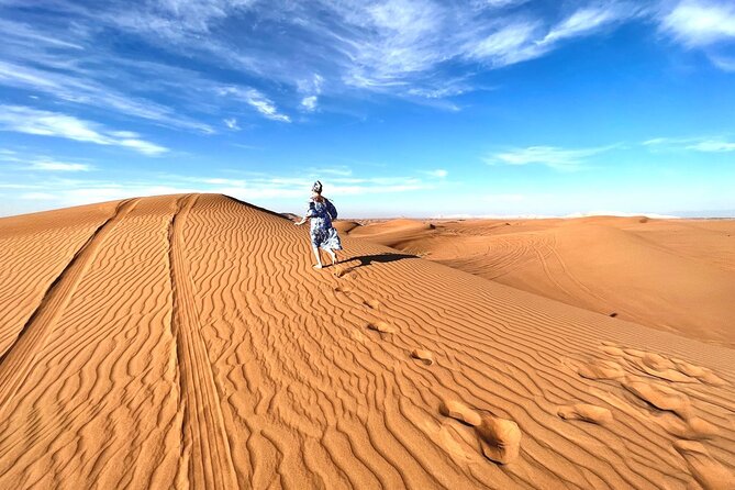 Exclusive Desert safari - A short camel ride and sandboarding