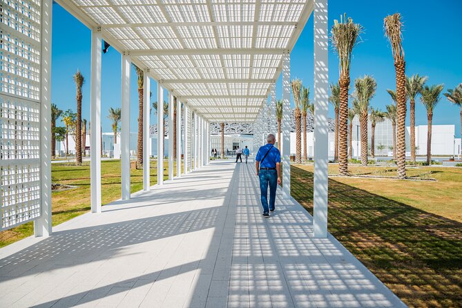 From Dubai: Abu Dhabi Day Tour with Grand Mosque & Louvre Museum - The guides and the human side of the day