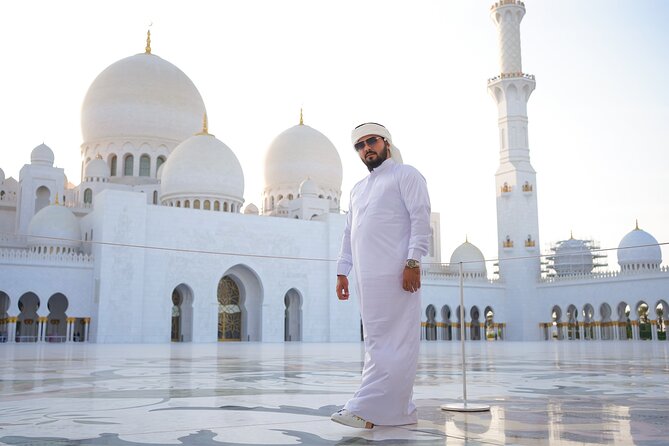 From Dubai: Abu Dhabi Sheikh Zayed Grand Mosque Guided Tour - Entering the mosque and preparing for the visit