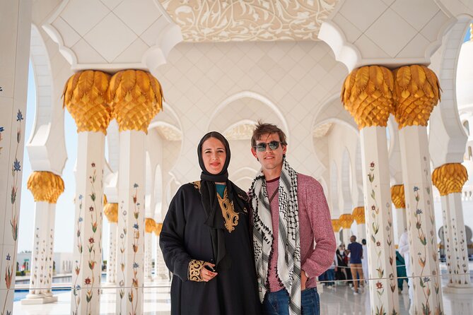 From Dubai: Abu Dhabi Sheikh Zayed Grand Mosque Guided Tour - Courtyards, columns, and reflective pools