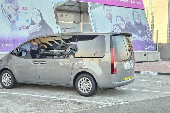 From Dubai: Private Chauffeur Service to Abu Dhabi - Emirates Palace and Etihad Towers for city photographs