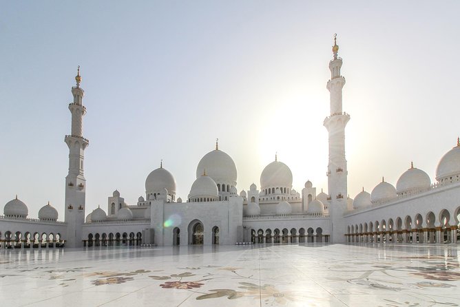 Full Day Abu Dhabi City & Louvre Museum Tour - Date Market, Corniche, and the quick city tour