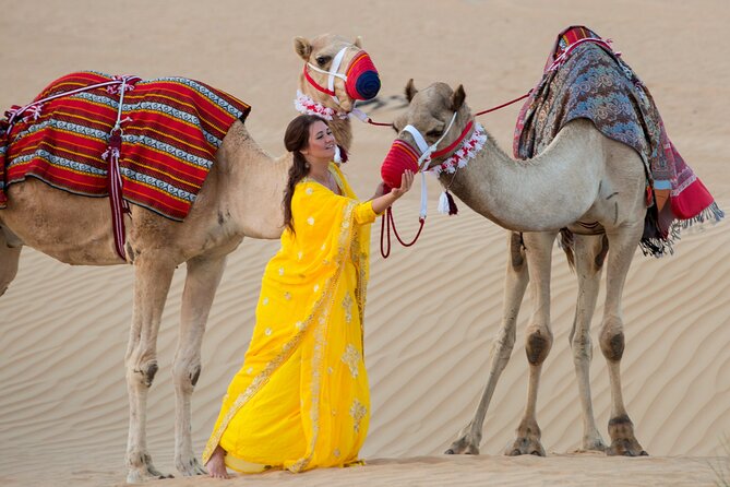 High Red Dunes with Camel Ride, Sandboarding, Falcon Show and VIP BBQ Dinner - Falcon photography and henna at Oscar Knight Tours Camp