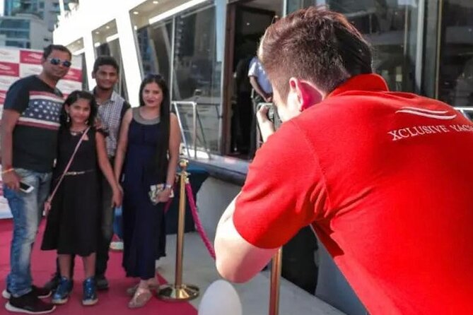 Luxury Dhow Cruise Dubai: Skyline Views & Fine Dining Experience - The red-carpet welcome sets the tone