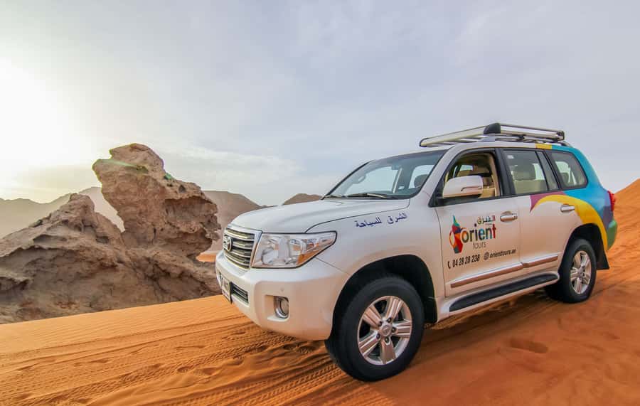 Mleiha Desert Safari with Sandboarding, Stargazing & Dinner - Dune bashing across the Mleiha sand