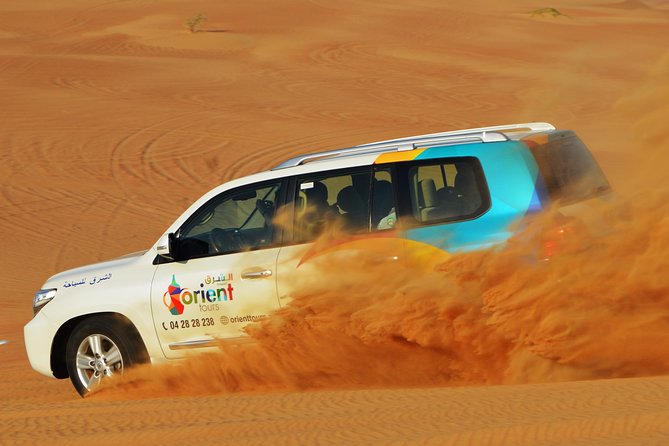 Mleiha Dubai Desert Safari with Stargazing and Dinner - Sandboarding on the dunes