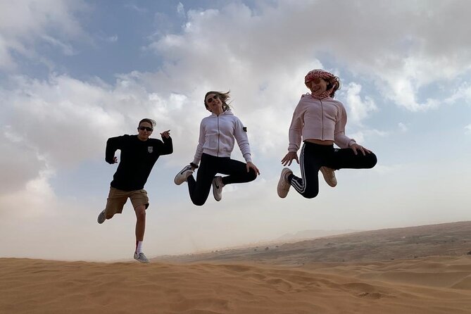 Morning Desert Safari, Quad Bike, Sandboard and Camel Ride - Dune driving and red-sand photo time in Lahbab