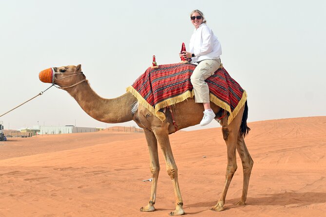 Morning Desert Safari, Quad Bike, Sandboard and Camel Ride - Sandboarding: fun, simple, and not for everyone