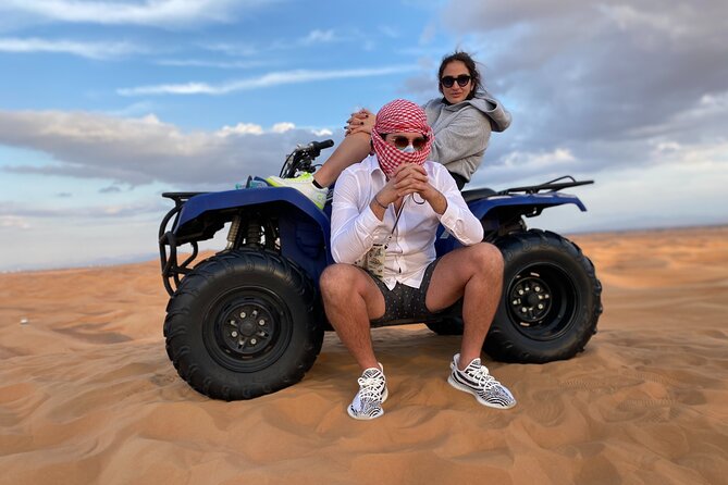 Morning Desert Safari, Quad Bike, Sandboard and Camel Ride - A camel farm with feeding and Arabic coffee