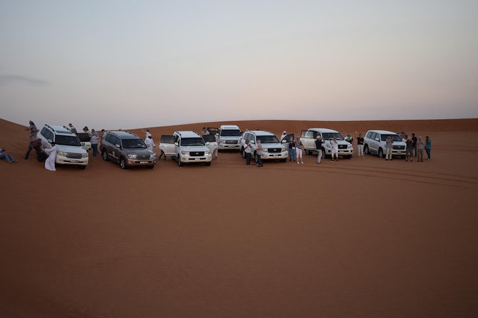 Morning Desert Safari with Camel Ride & Sand Boarding - Red dunes beyond Dubai
