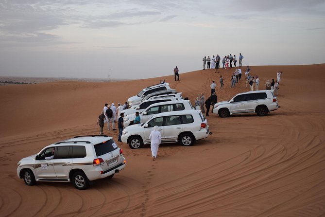 Morning Desert Safari with Camel Ride & Sand Boarding - The evening camp program needs clarification