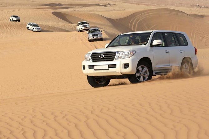 Morning Dubai Red Dunes Safari with Camel Riding & Sand Boarding - Heat, clothing, and health considerations