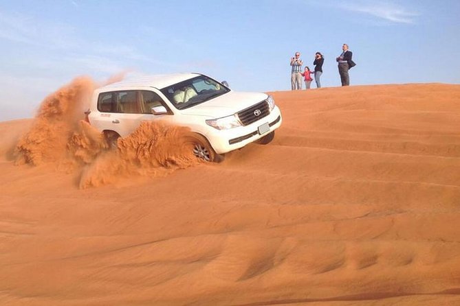 Morning Red Dunes Desert by Quad Bike, Dune Bashing, Camel Ride & Sandboarding - Thirty to forty minutes of dune bashing