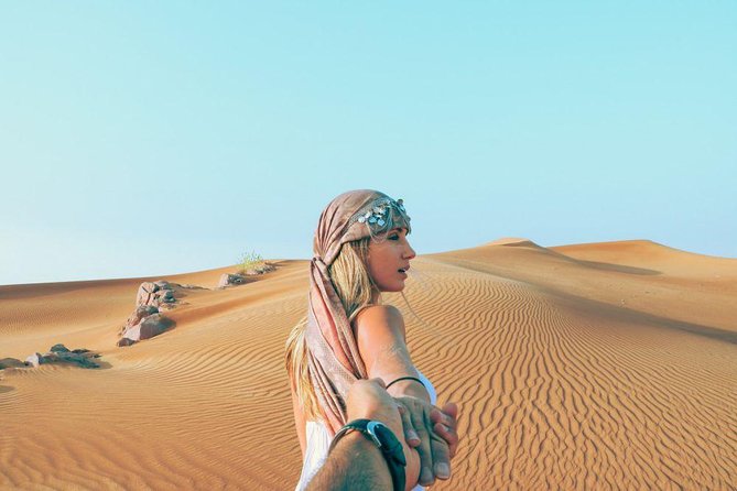 Morning Red Dunes Safari: Camel Ride & Sandboarding Adventure - Photos, Water, and the Morning Desert Feel
