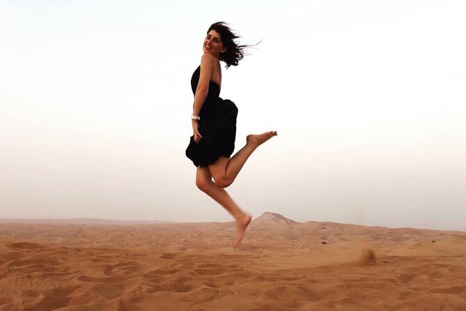 Morning Red Dunes Safari: Camel Ride & Sandboarding Adventure - Shared SUV Comfort and Group Size