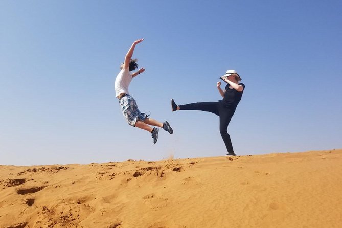 Morning Thrill: Exciting Desert Safari Adventure Camel Ride Dubai - Sandboarding gives you a second kind of thrill
